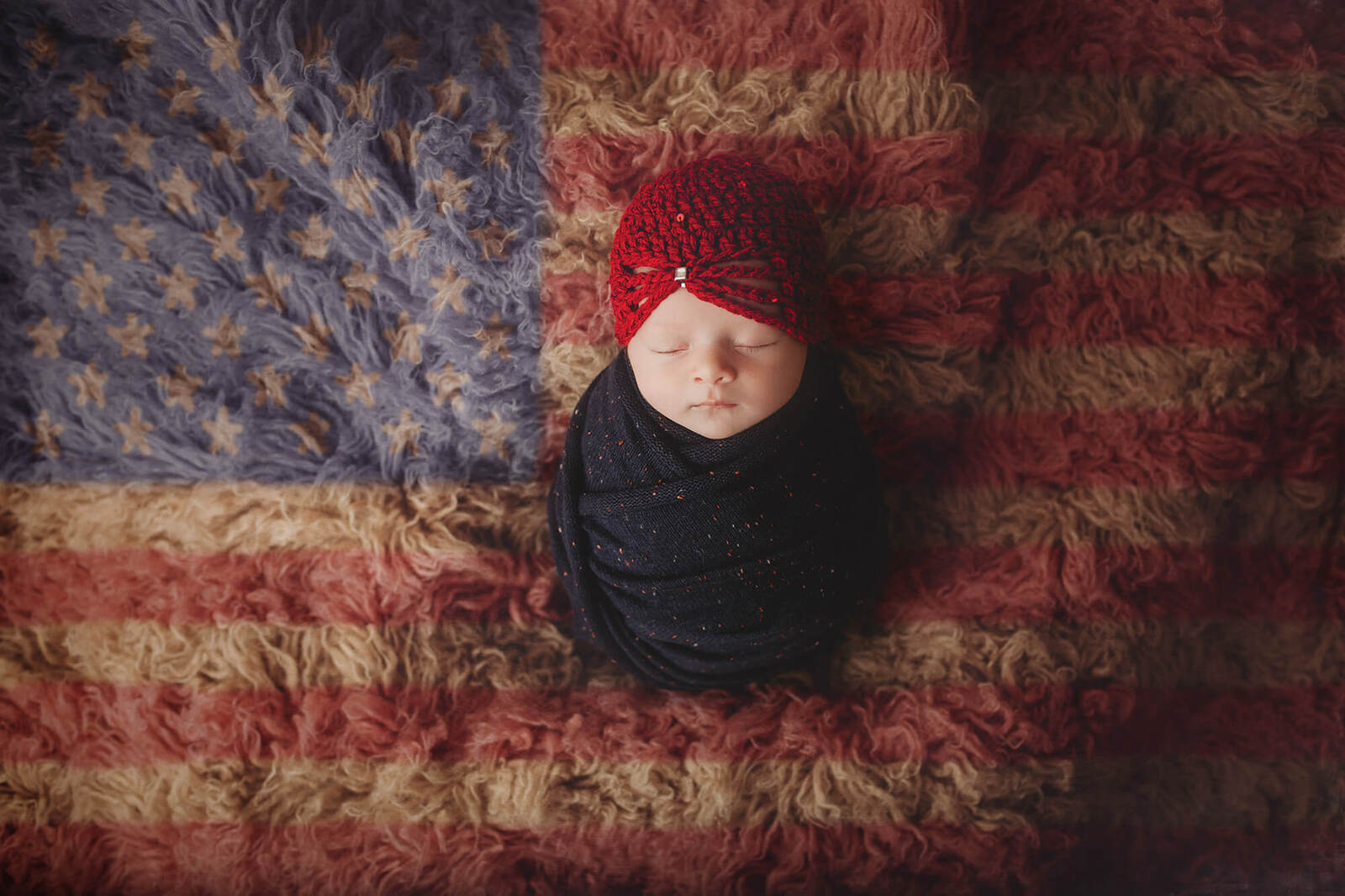 newborn girl ready for the Fourth of July by wiesbaden newborn photographer