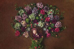 Newborn girl in a colorful floral tree of life by Wiesbaden newborn photographer