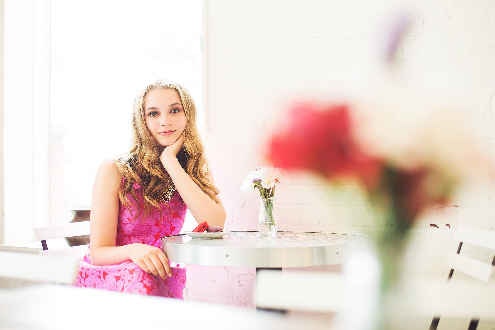 Grace during her senior portrait session at Woops! bakery outside of the University of Arizona