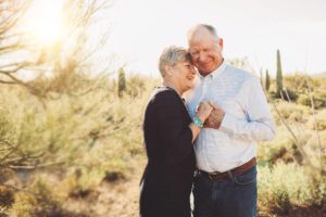 A young-at-heart couple celebrates their 50th anniversary with their family and a family photo session at Gates Pass