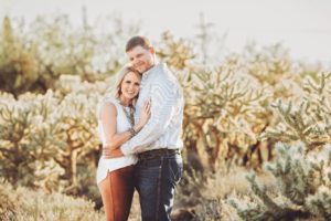Mom and Dad cuddle during their desert photoshoot while visiting Tucson