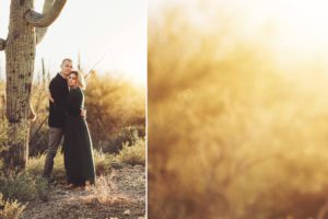 Husband and wife stand next to a saguaro holding one another during their family photo session with Belle Vie Photography at Gate's Pass in Tucson