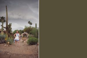 A woman dressed like a Grecian goddess surrounded by saguaros at the entrance to Hacienda Del Sol during a Tucson monsoon