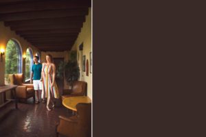 Husband and wife stroll through the beautiful corridors of the Hacienda Del Sol resort in Tucson