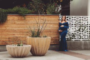 A maternity session outside of a downtown Tucson nightclub