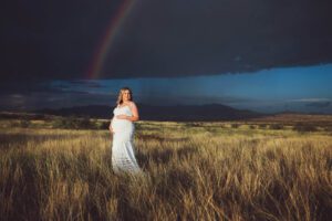 A summer storm in Sonoita produces a rainbow during a breathtaking maternity session