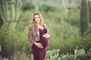 Gorgeous expectant mom Amanda poses with her beautiful bump during her desert maternity session