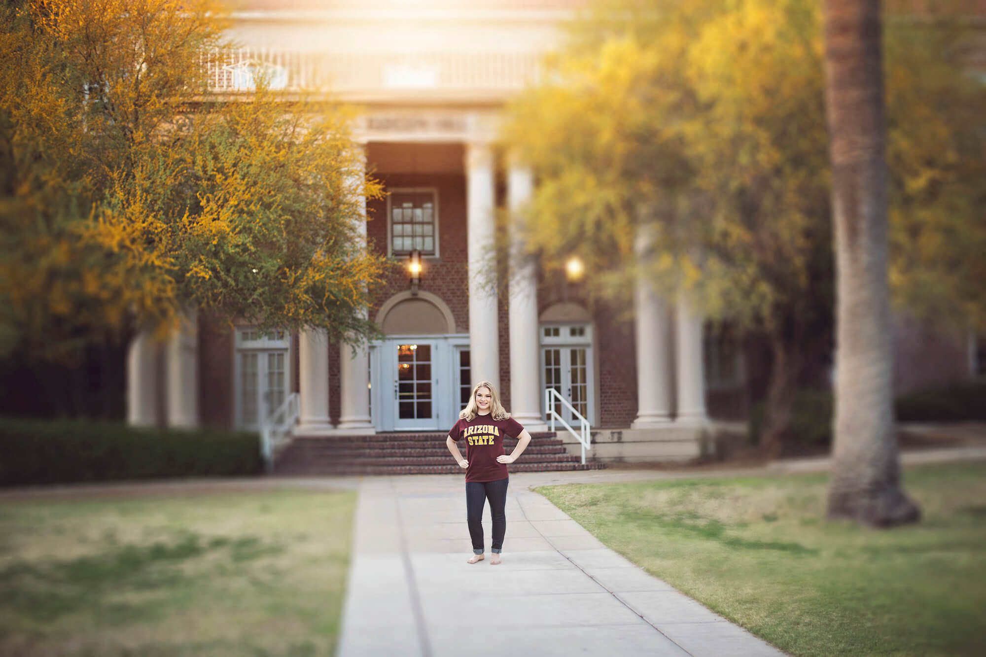 High school senior, Olivia, enjoys the Arizona sunshine and proudly wears her future college's t-shirt