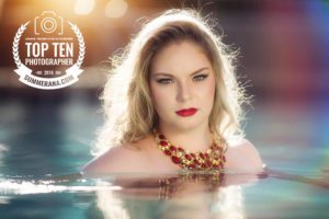 A glamorous senior photo session ends with sunset pool photos in Tucson
