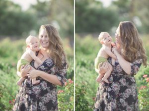 A mom and her son are all smiles during their sunset breastfeeding session at Tucson's Reid Park rose garden