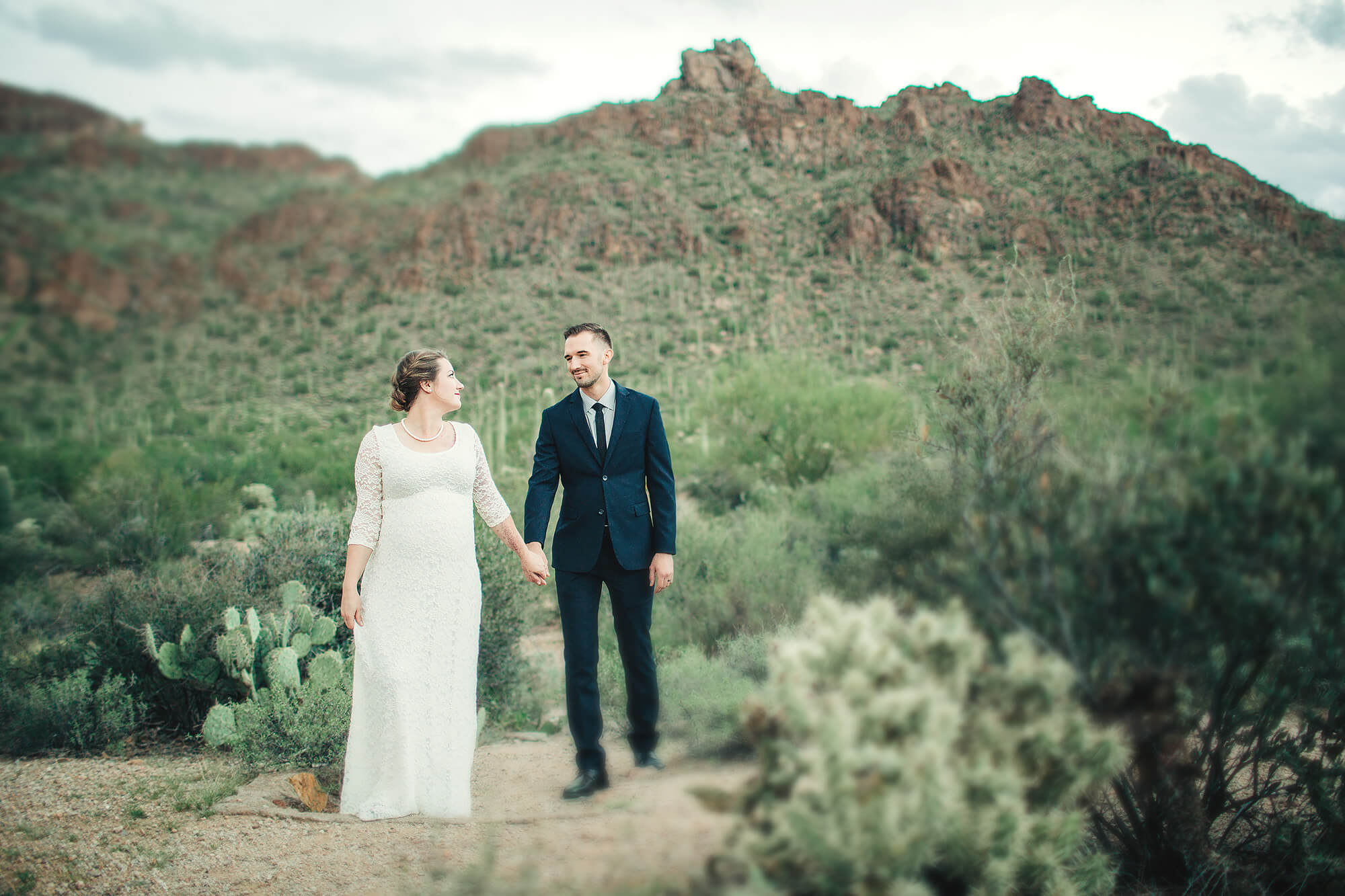 Beautiful rocky peaks were a stunning backdrop for their desert elopement session in Tucson.