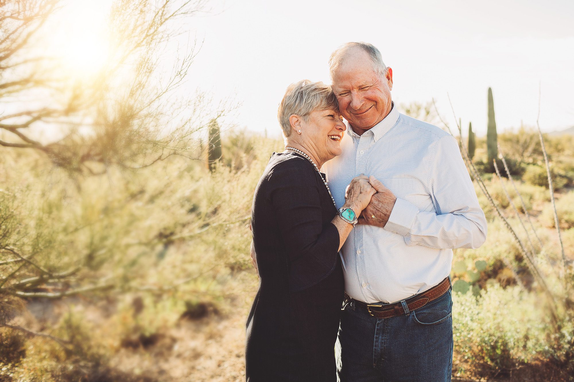 Husband and wife celebrating their anniversary with a desert photoshoot in Tucson