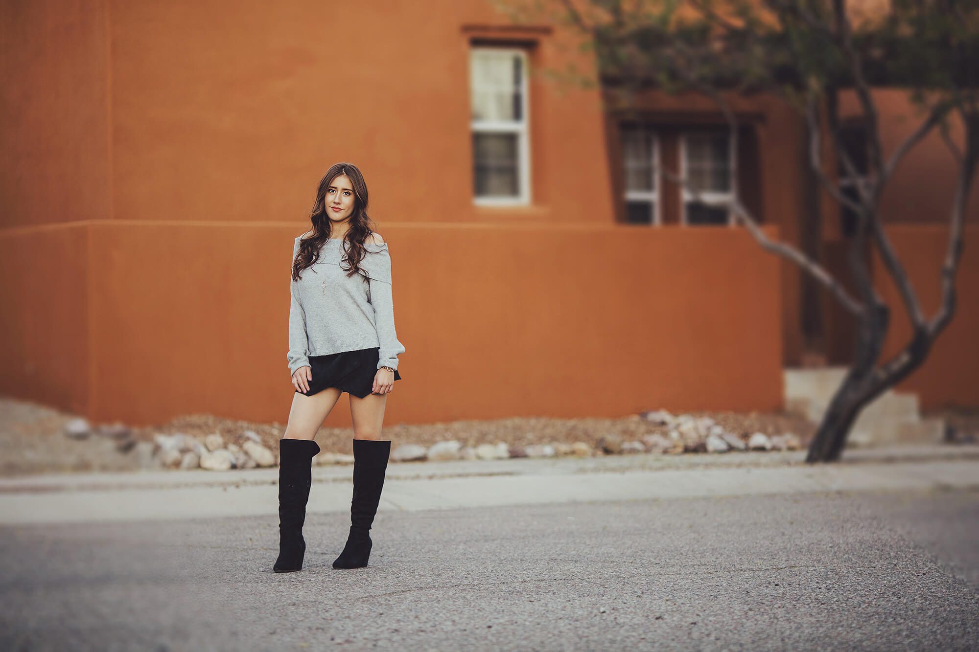 Brianna, a Cienega High School senior, stands tall in beautiful contrast to the Southwest-style of her Tucson home during her senior photoshoot
