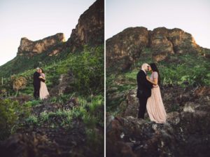 The Paxman's surrounded by the wild beauty of Picacho Peak in the spring during their couple's session with Belle Vie Photography