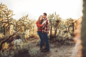 Surrounded by jumping cactus, the Freeman's hold each other as the sun illuminates everything around them to a golden glow