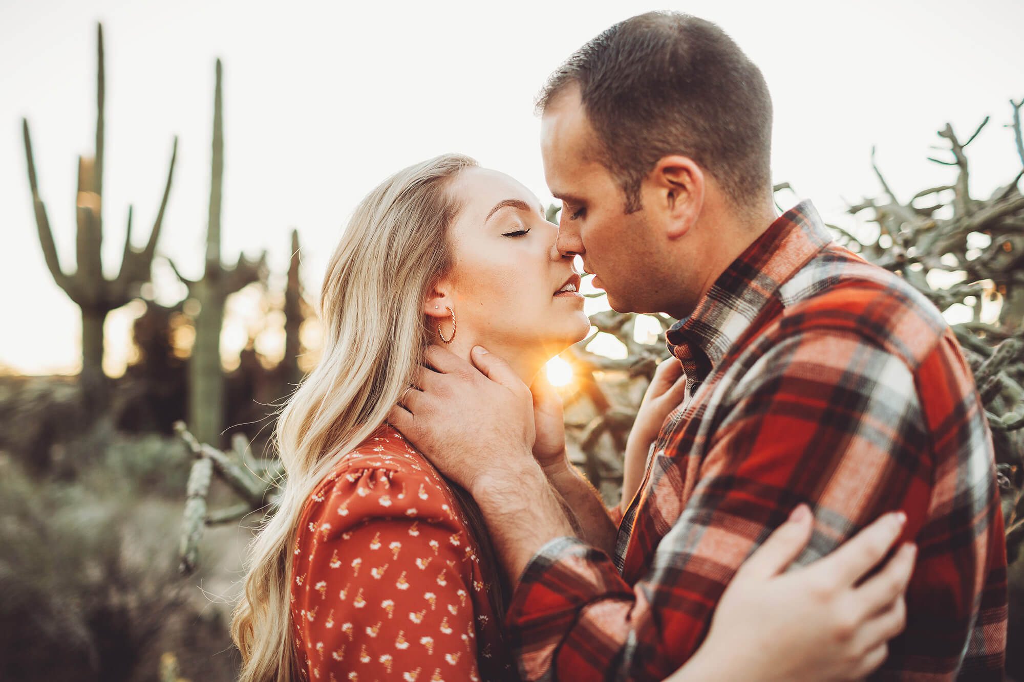 A romantic sunset kiss for the Freeman's during their couple's session at Sabino Canyon
