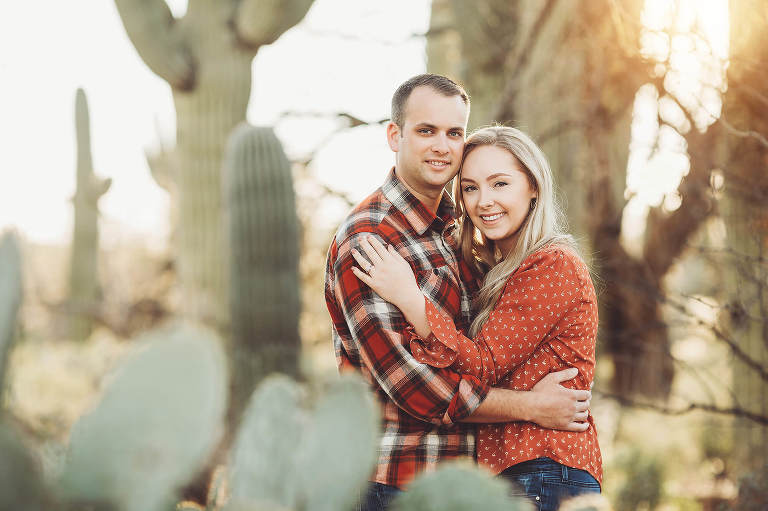 The Freeman's cuddle during their sunset couple's session at Sabino Canyon