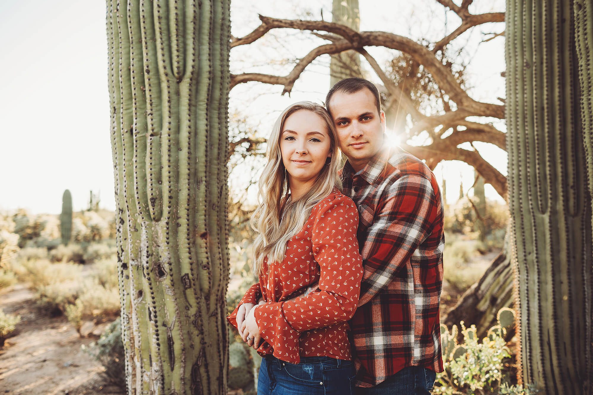 Sunglight shines through the desert branches as the Freeman's hold one another