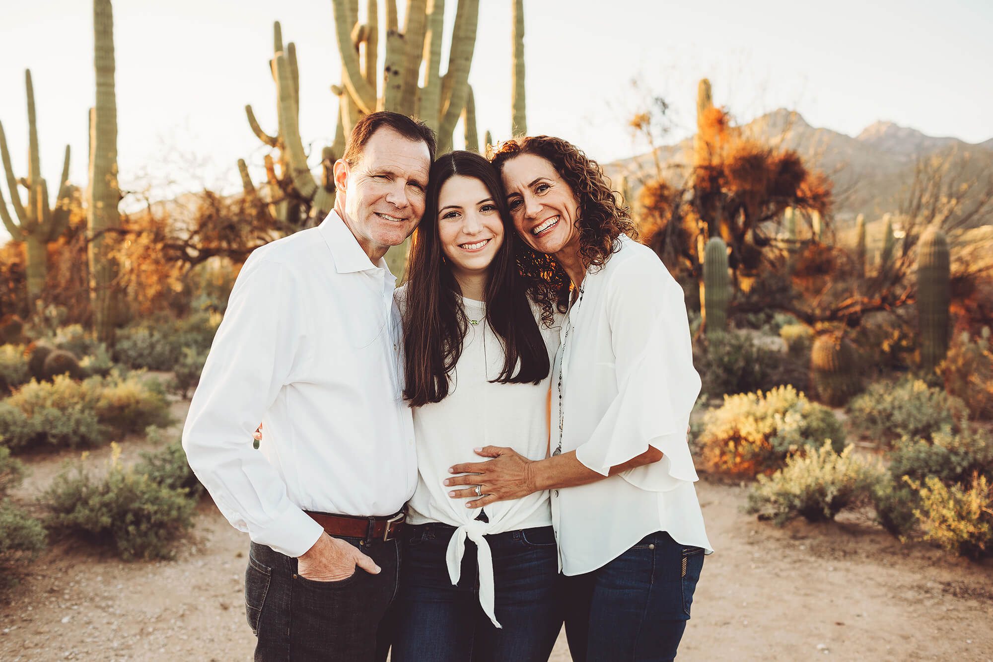 Mom and dad and their oldest daughter at Sabino Canyon