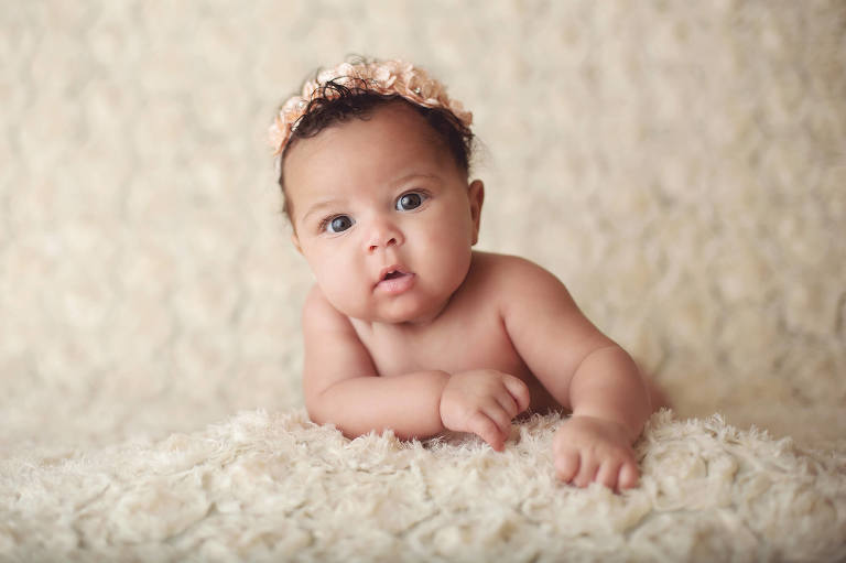 This three-month old little girl was a kick to photograph during her milestone session.