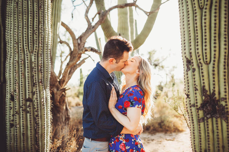 Shaun and Ally embrace surrounded by sunlight during their couple's session with Tucson couple's photographer Belle Vie Photography