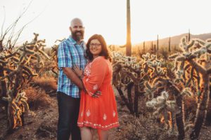 Enjoying the desert sun and each other's warm embrace during their family photo session