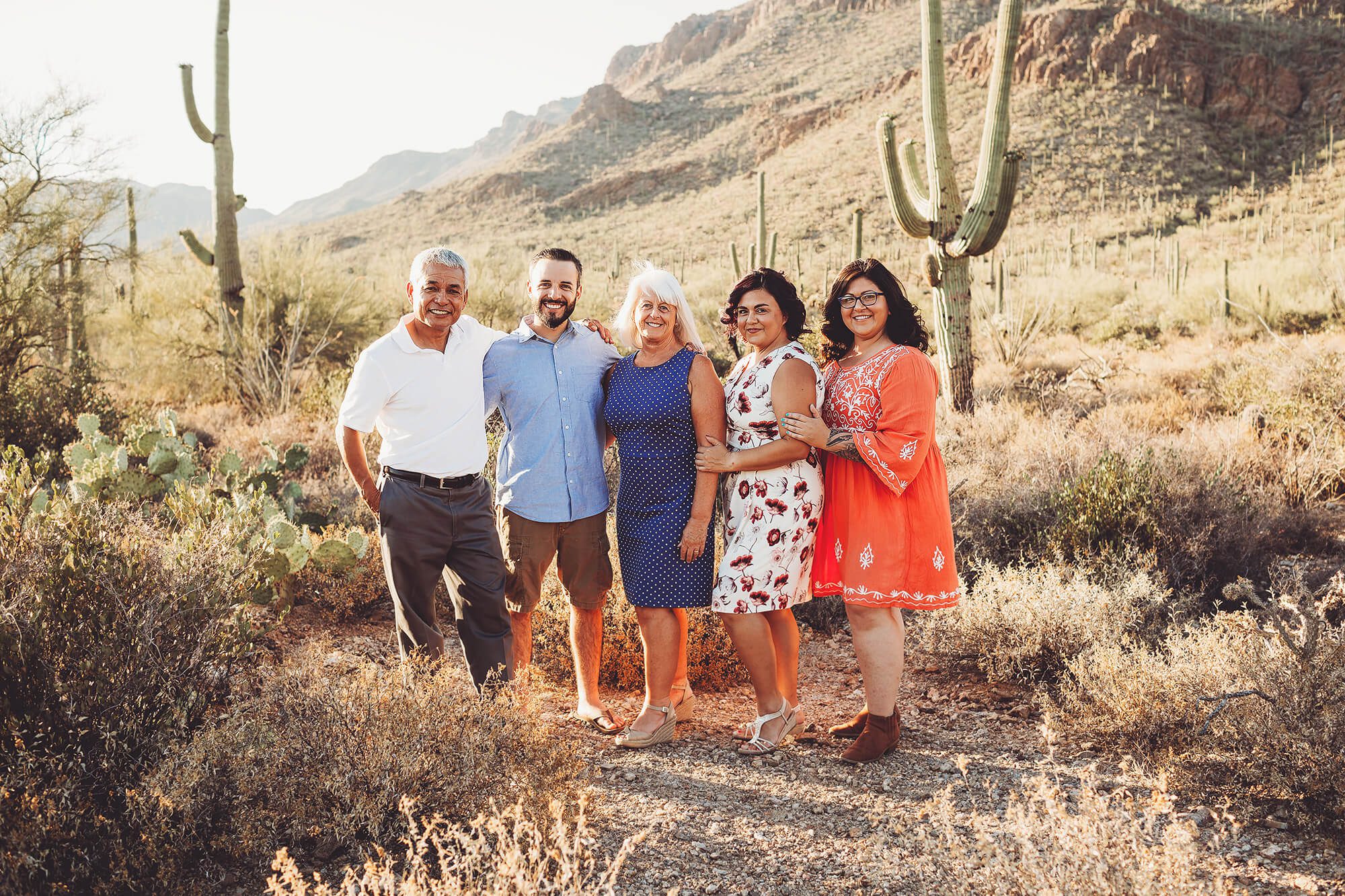 The Castillo family at Gates Pass celebrating their reunion with a family photo session