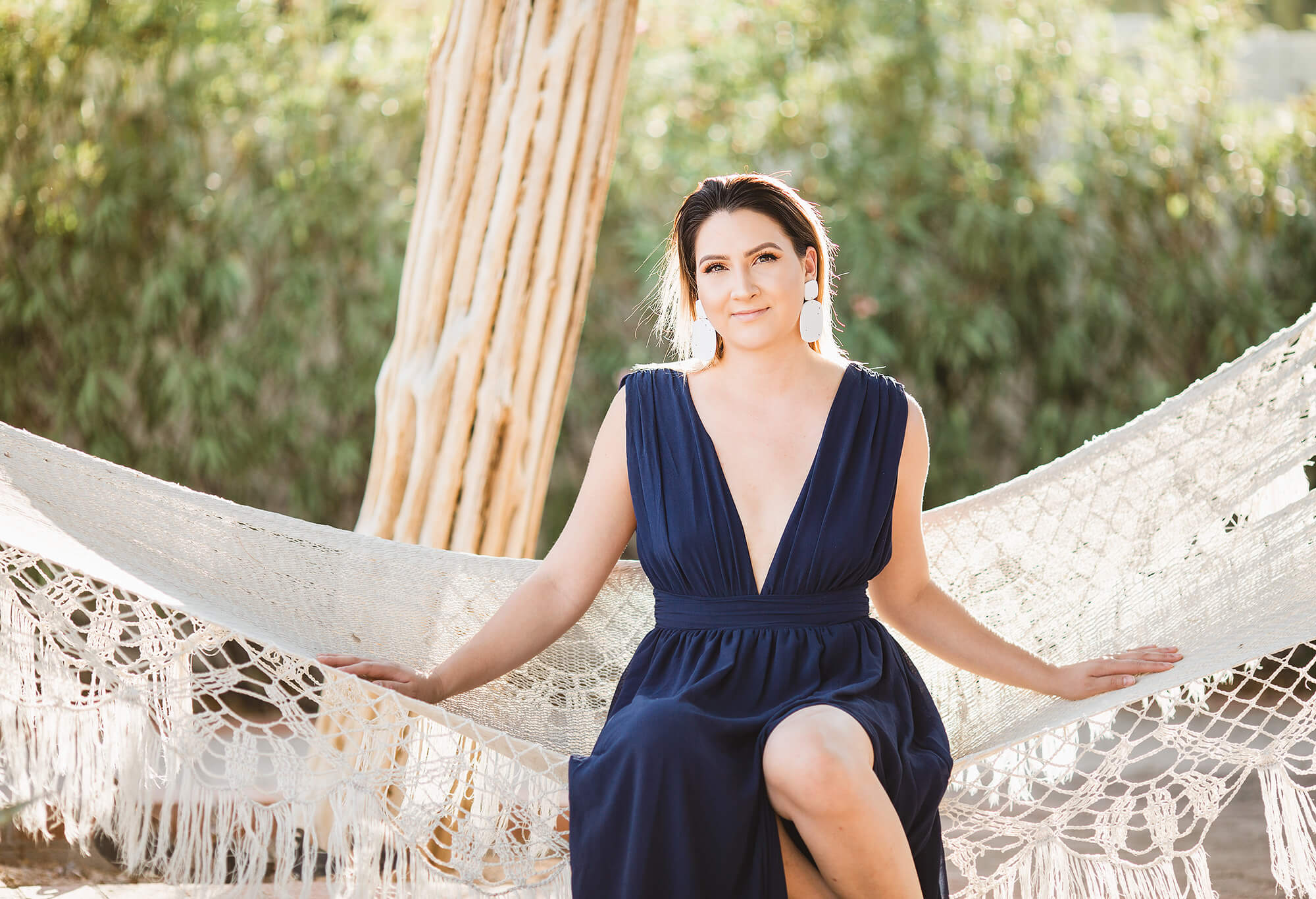 An evening gown, macrame hammock, and a saguaro skeleton...who knew they would look so good together.