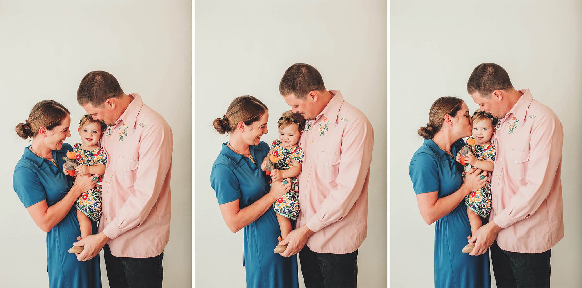 Mom and dad love on their little Alma during her first year cake smash session