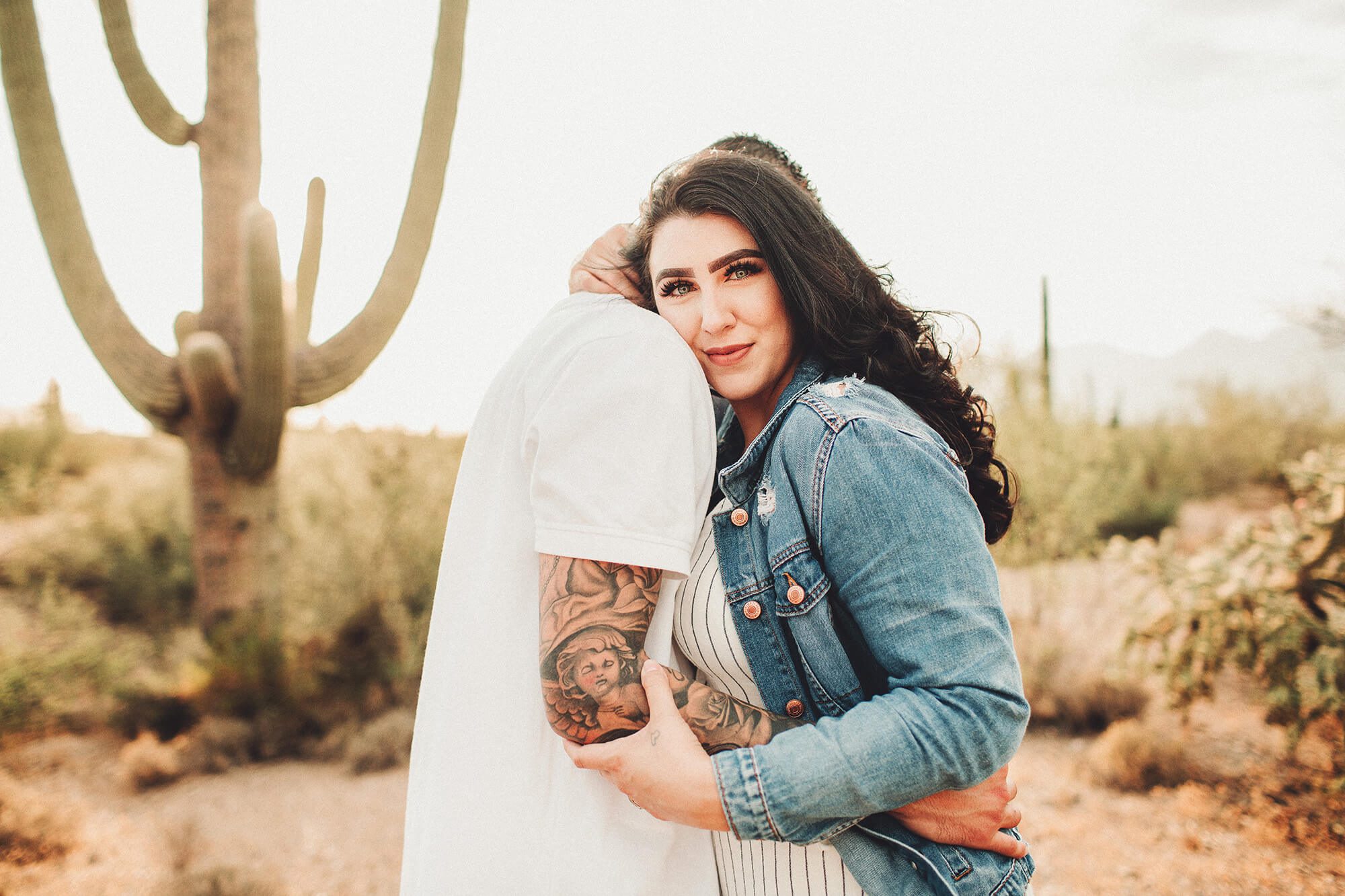 Hugs and sunsets during their desert family session