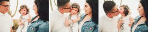 Mom and Dad Galindo love on their little girl during their desert family session