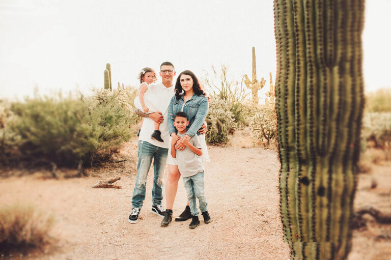 The Galindo family together in their new desert home during their desert family photo session
