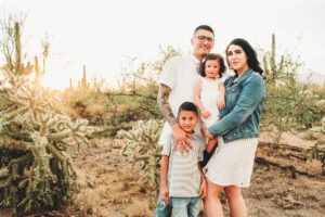 The Galindo family at sunset at Saguaro National park, the perfect photo to end their hot, but beautiful session