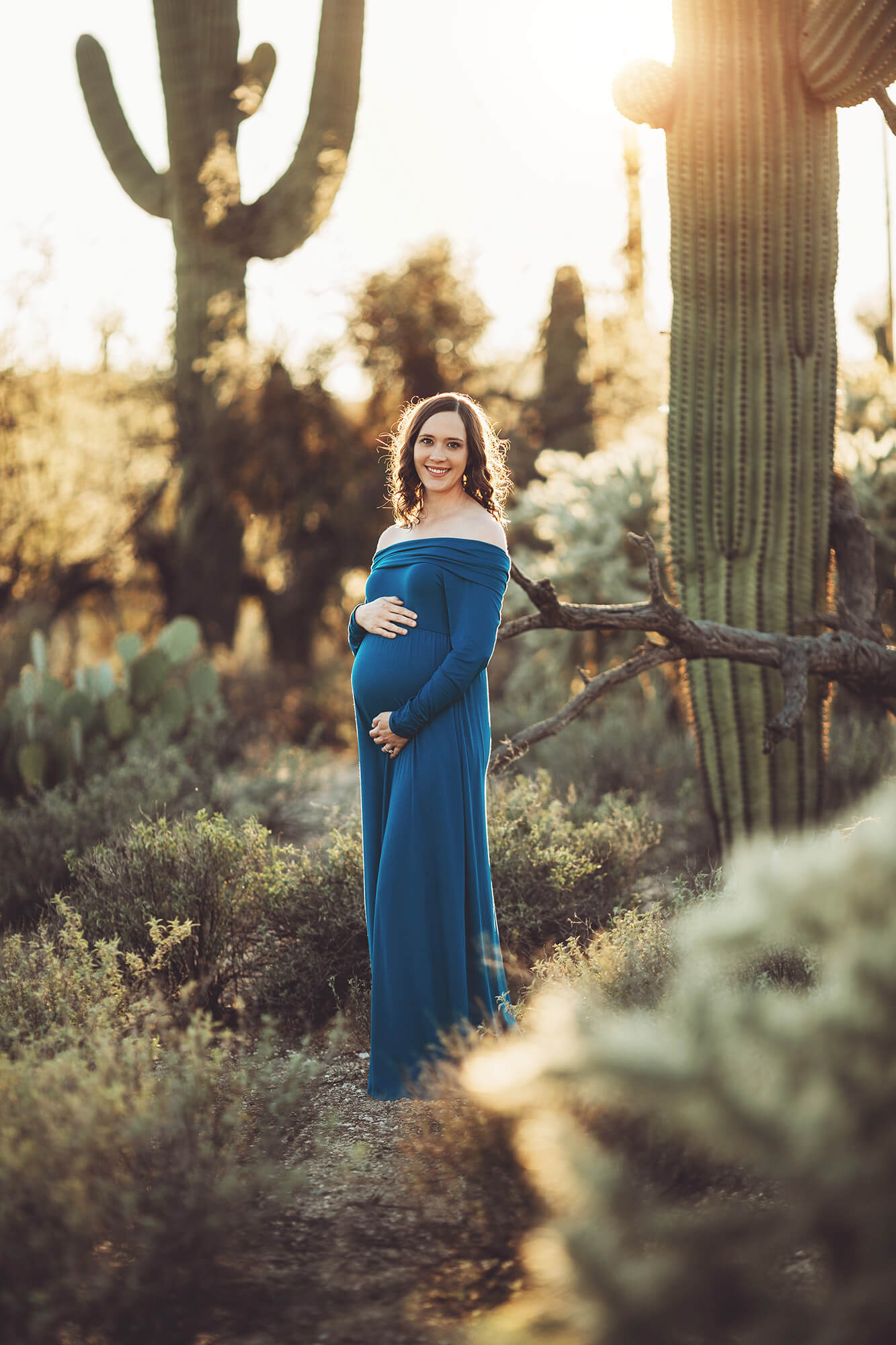 Adrianne stands amidst the saguaros at Sabino canyon