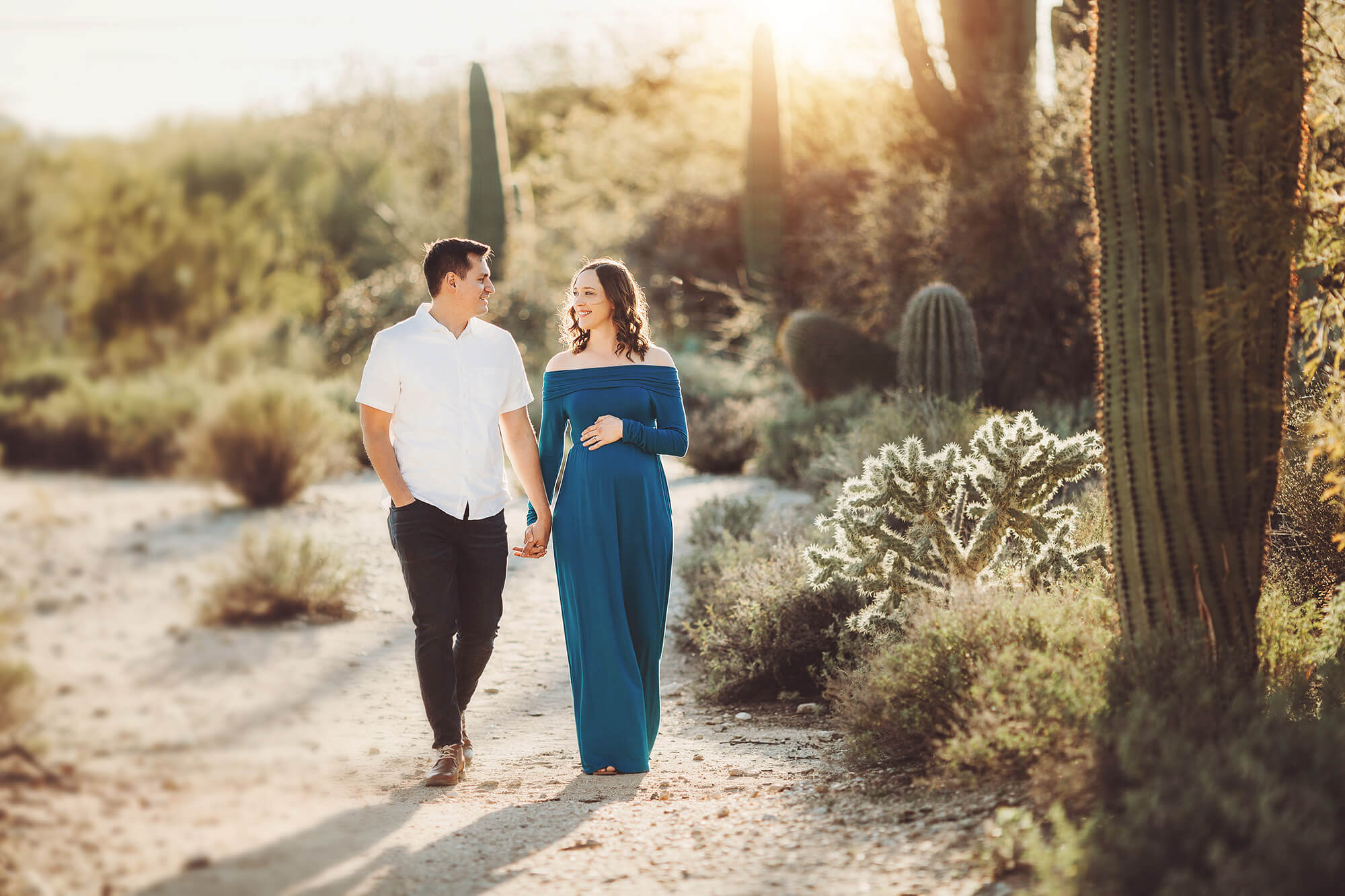 A sweet walk for mom and dad during their Sabino maternity session