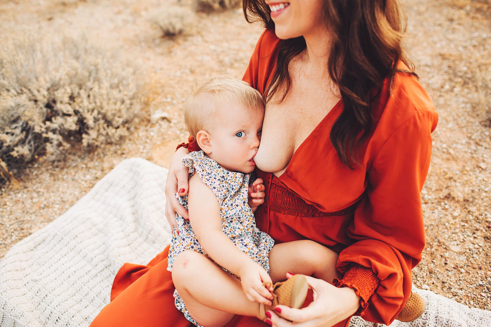 A sunrise breastfeeding session at Saguaro National Park