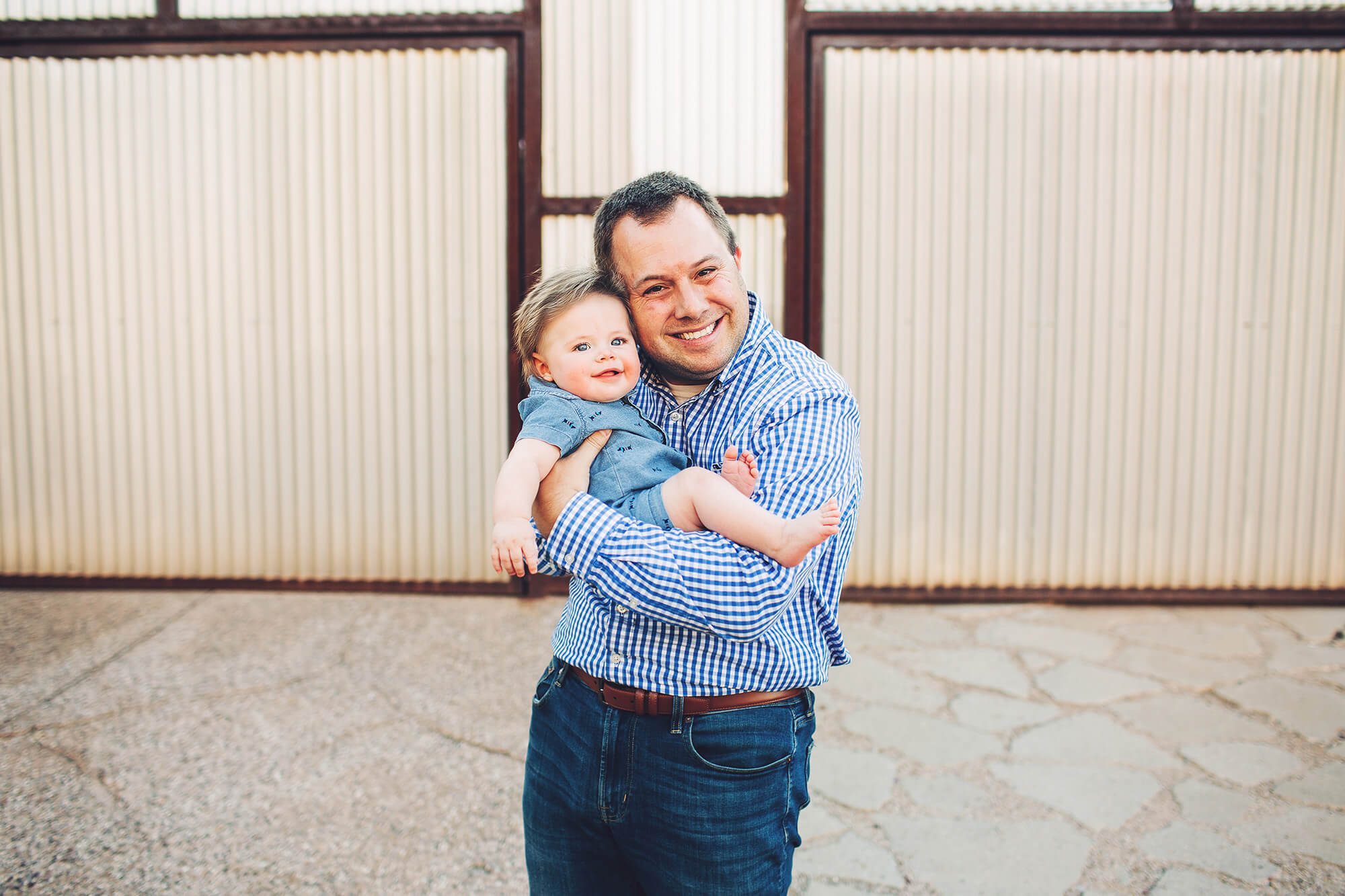 Dad and his baby boy during their family photo session in downtown Tucson