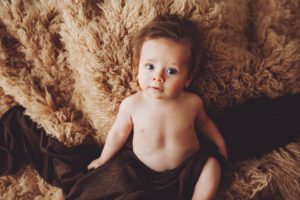 Darling little Carter in brown during his three-month session