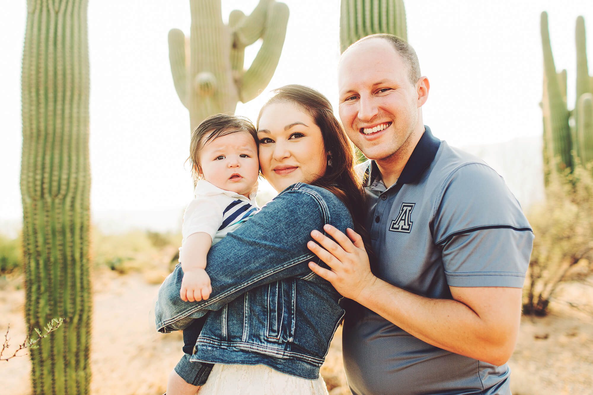 The lovely Marstall family smiling and cuddling together