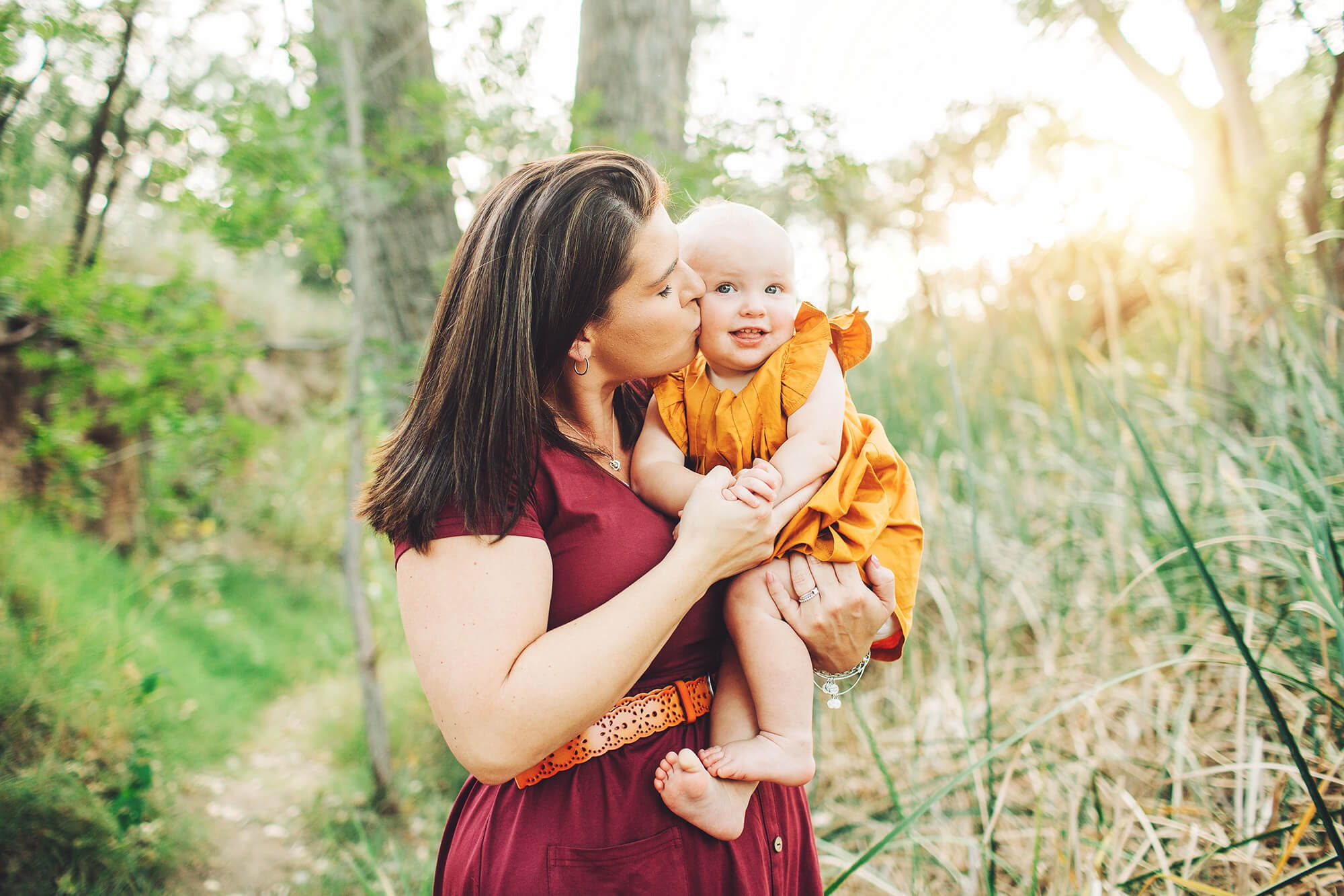 She wanted to walk so badly, but mom got a quick kiss in the struggles.