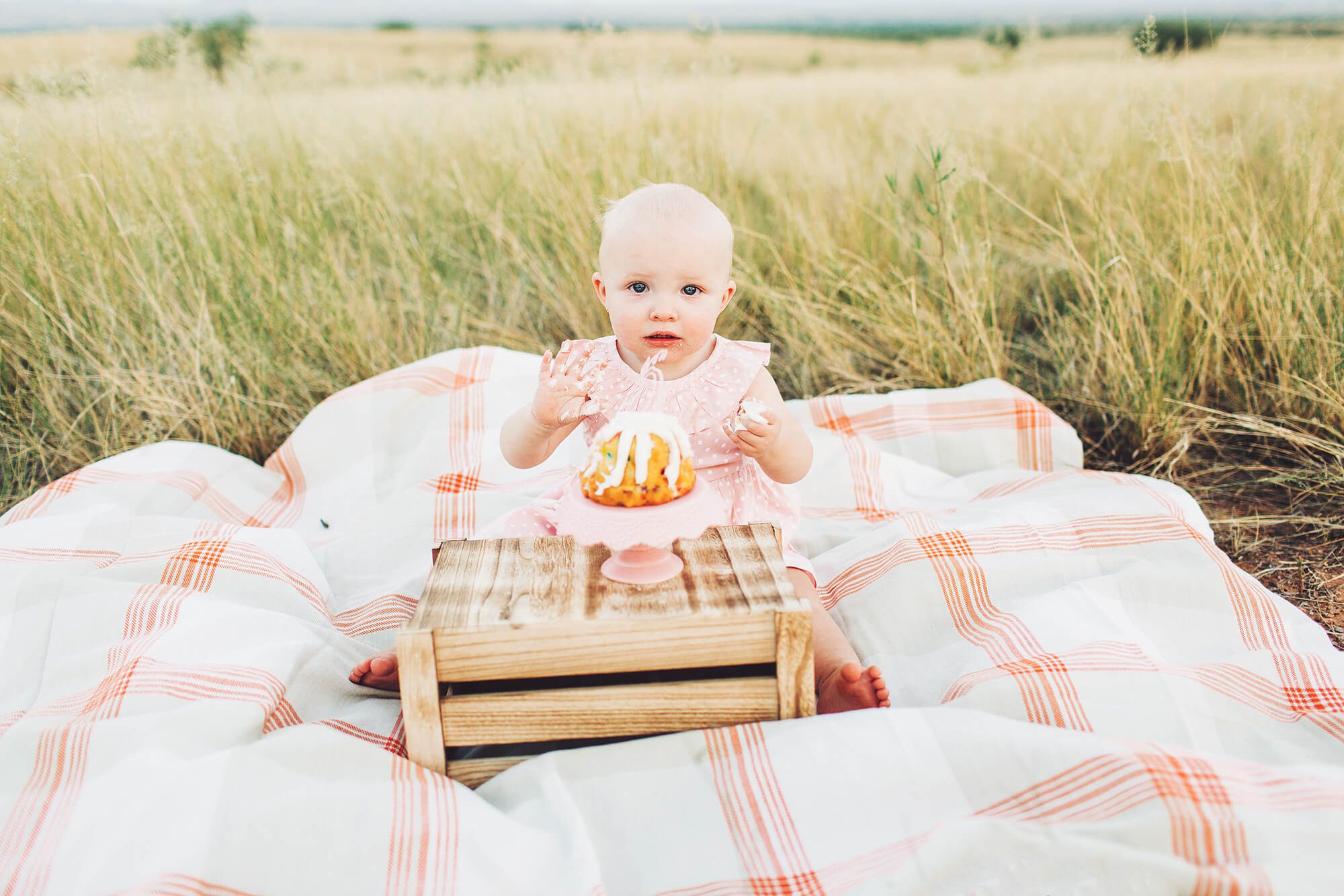 This little girl was a bit unsure at first, but ended up loving her cake.