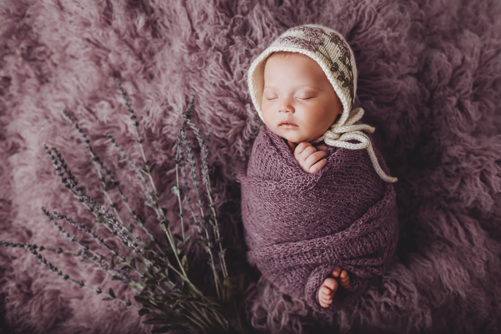 Lavender bonnet, lavender flowers, and a matching flokati