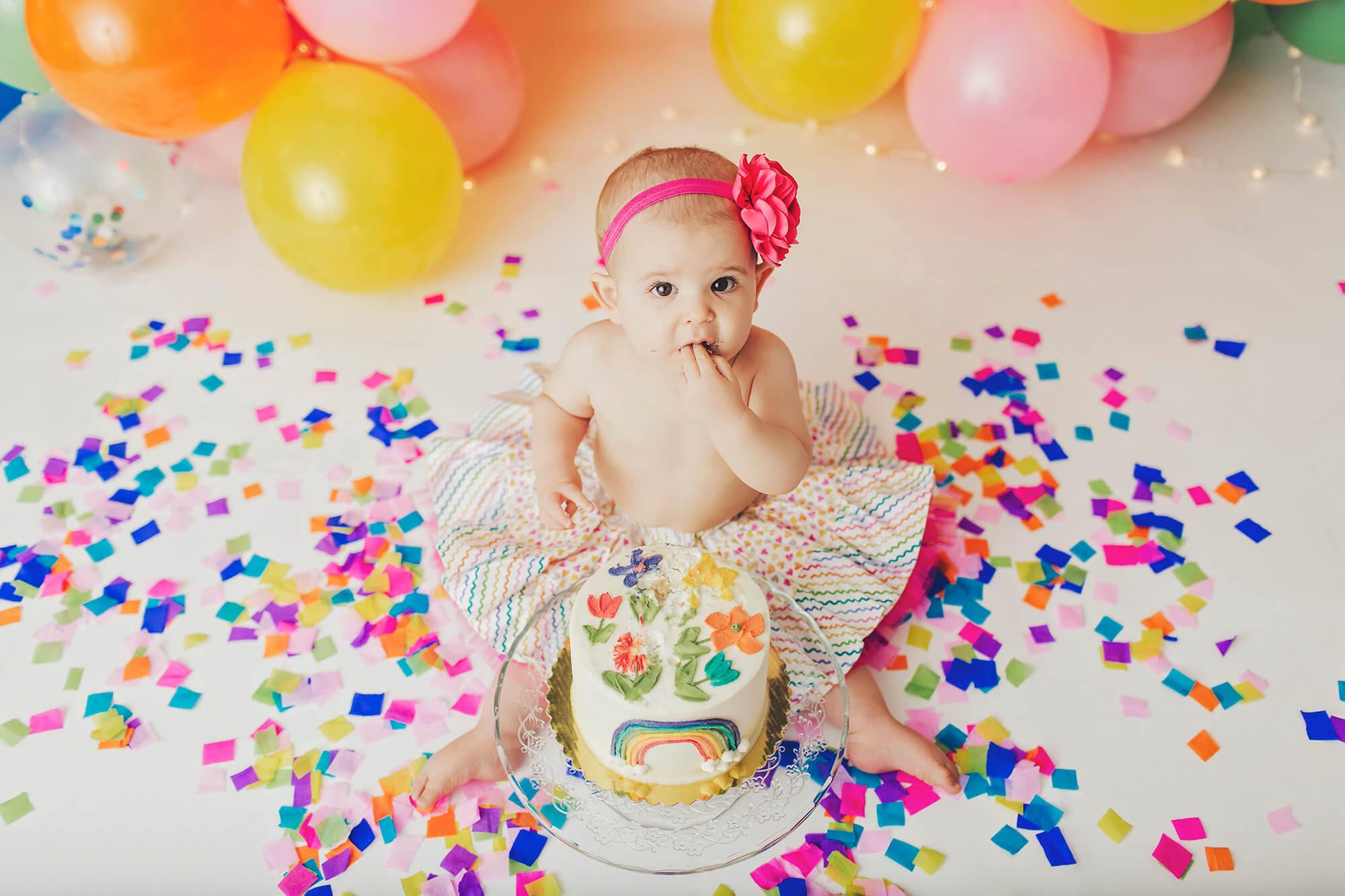 Mom brought matching birthday tutu and onesie for her session.