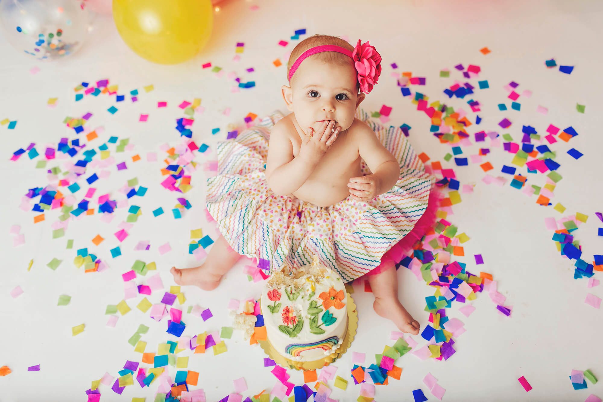 She didn't mind looking away from her cake, every now and then.